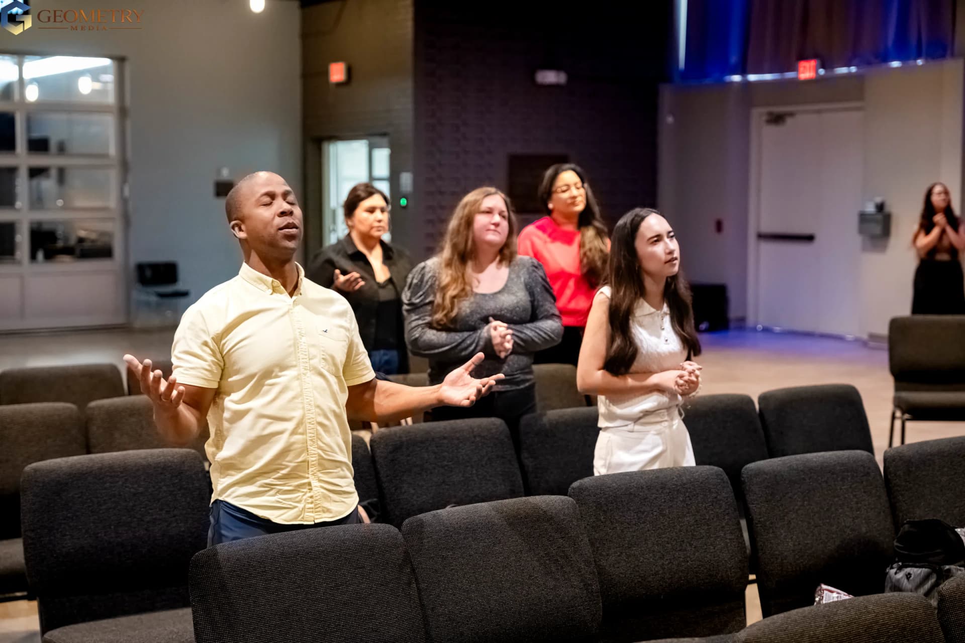 Speaker addressing the congregation during a Dallas church service