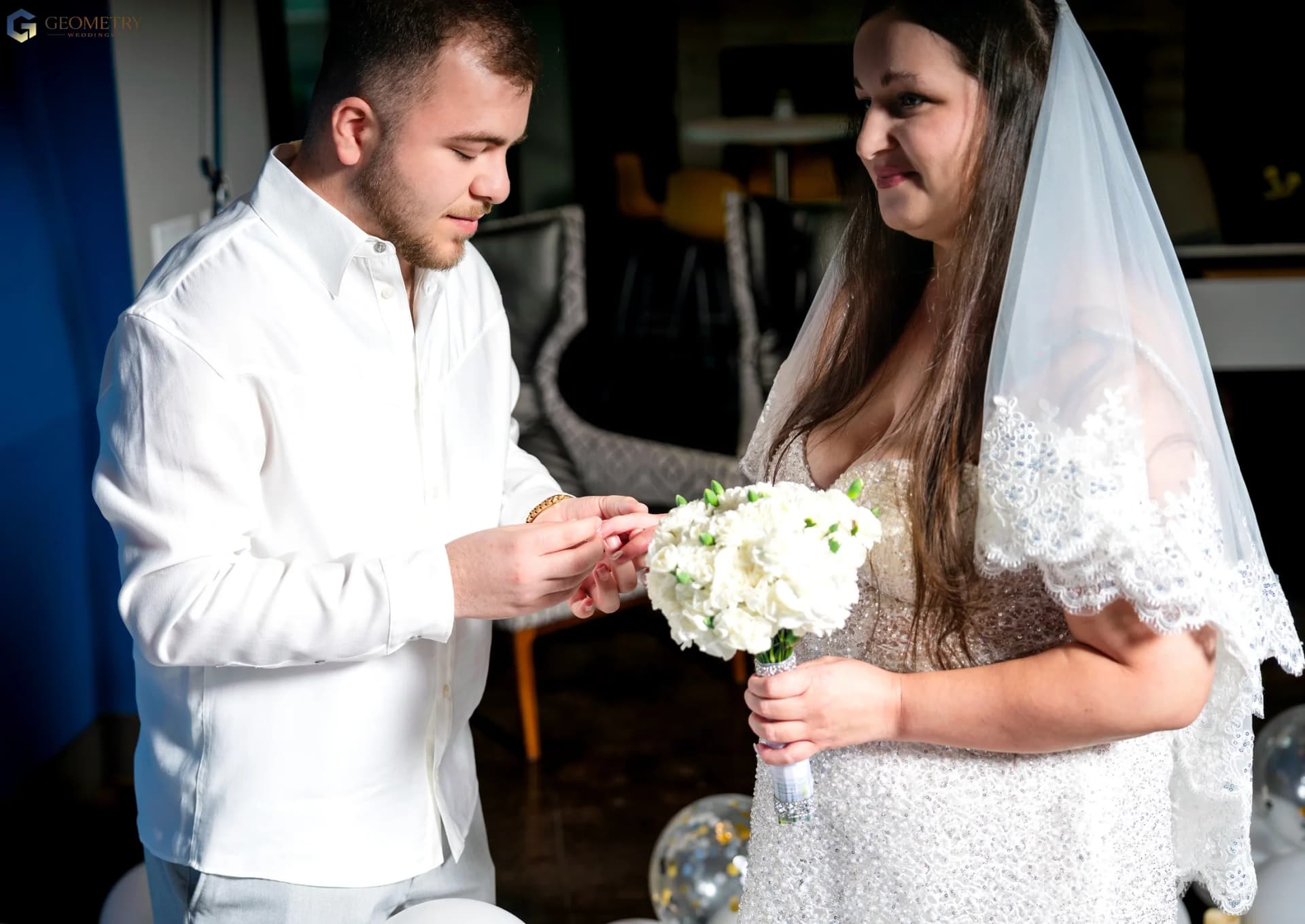 Wedding ring exchange during an intimate ceremony