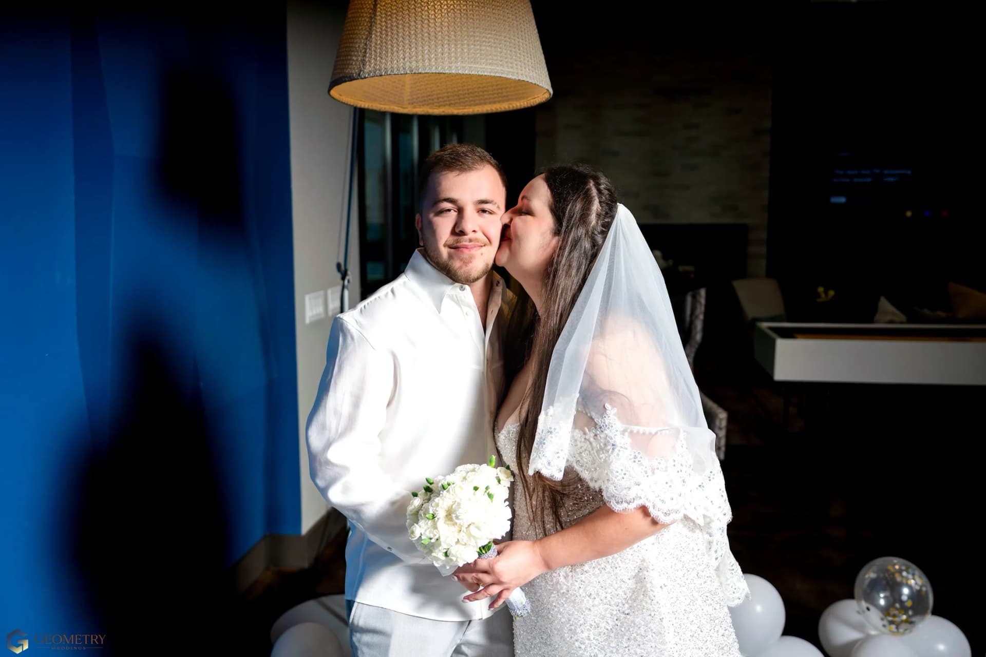 Valentina kissing Shaiq after their Dallas wedding