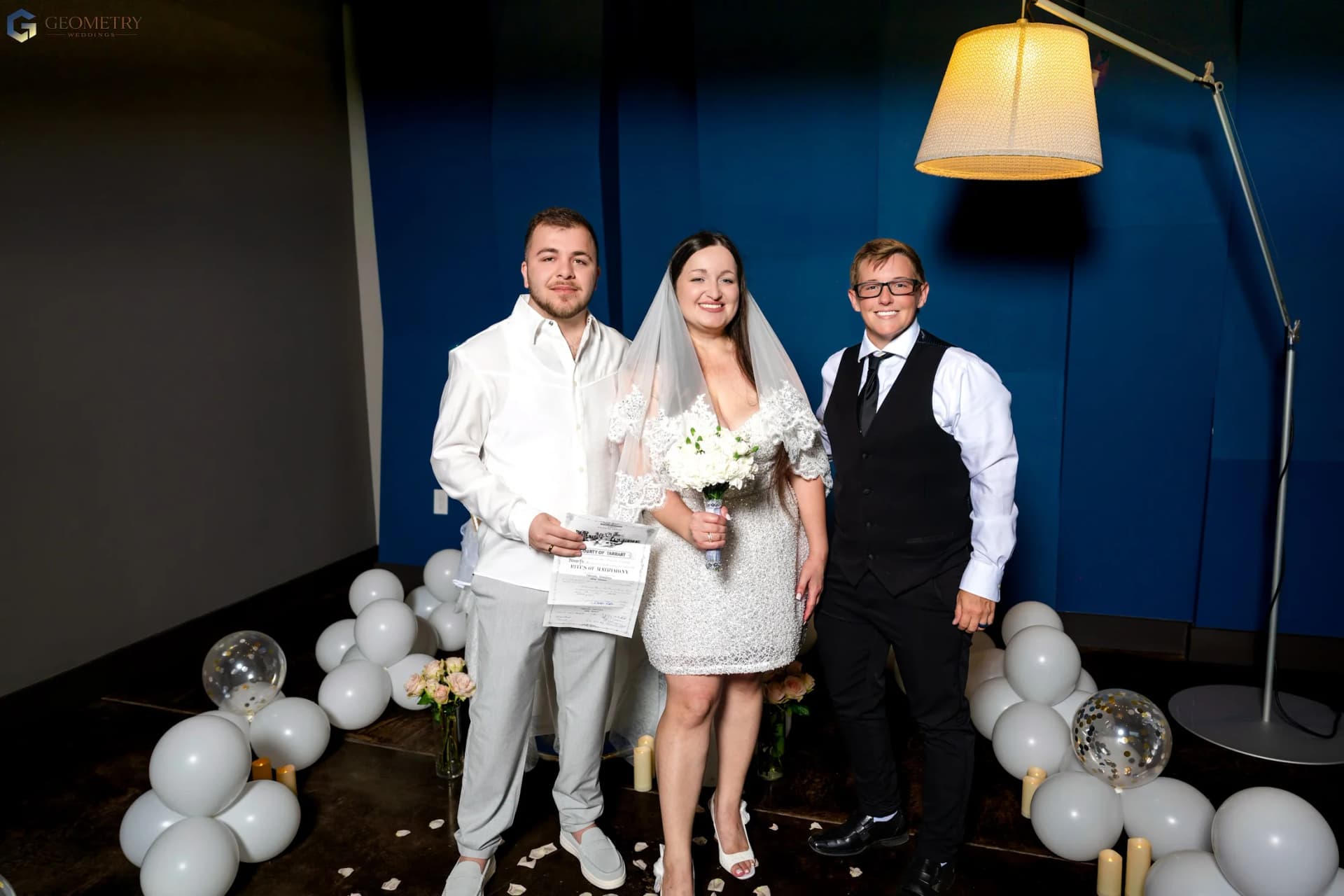 Valentina and Shaiq with their wedding officiant