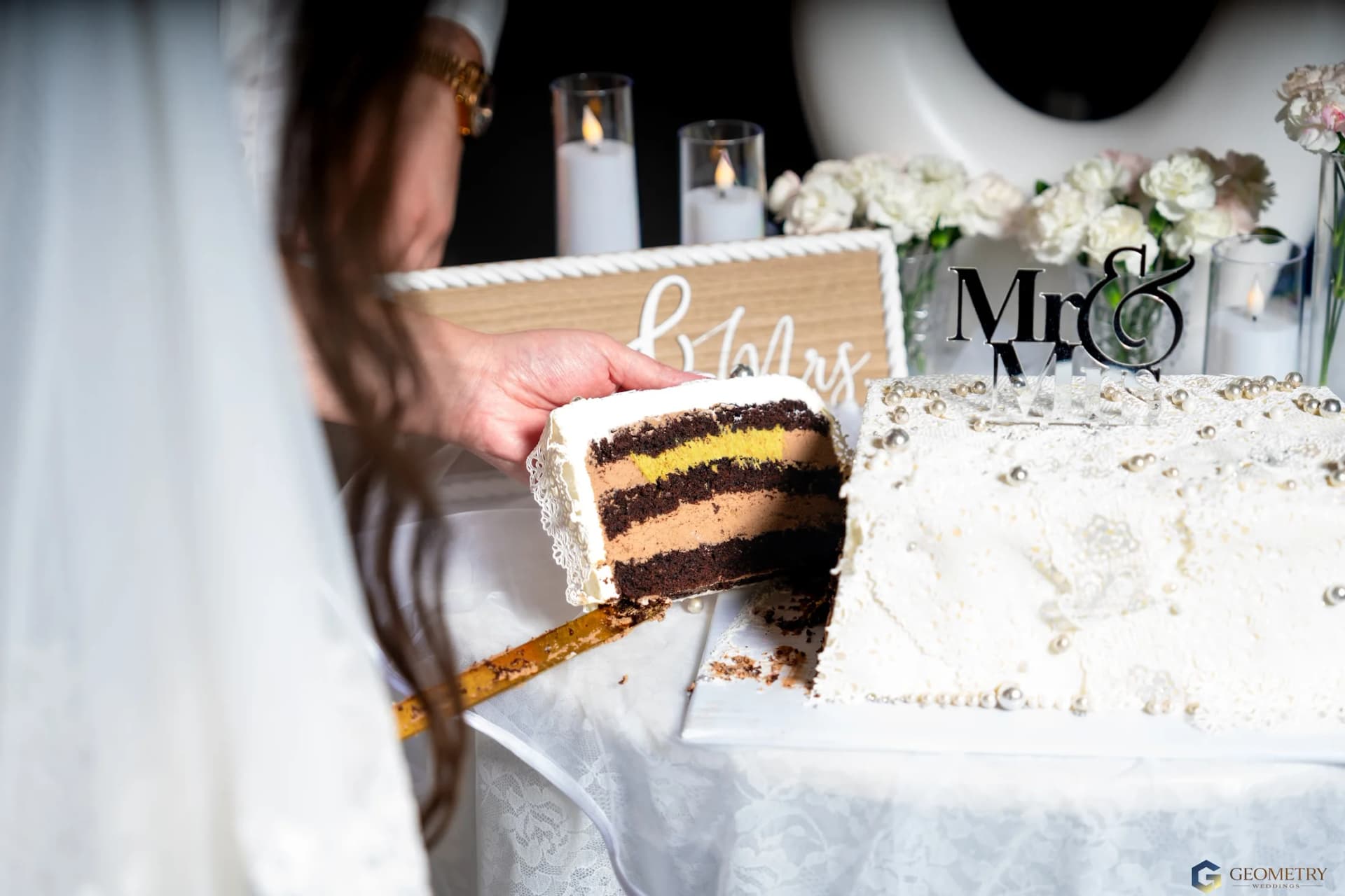 Freshly cut wedding cake detail