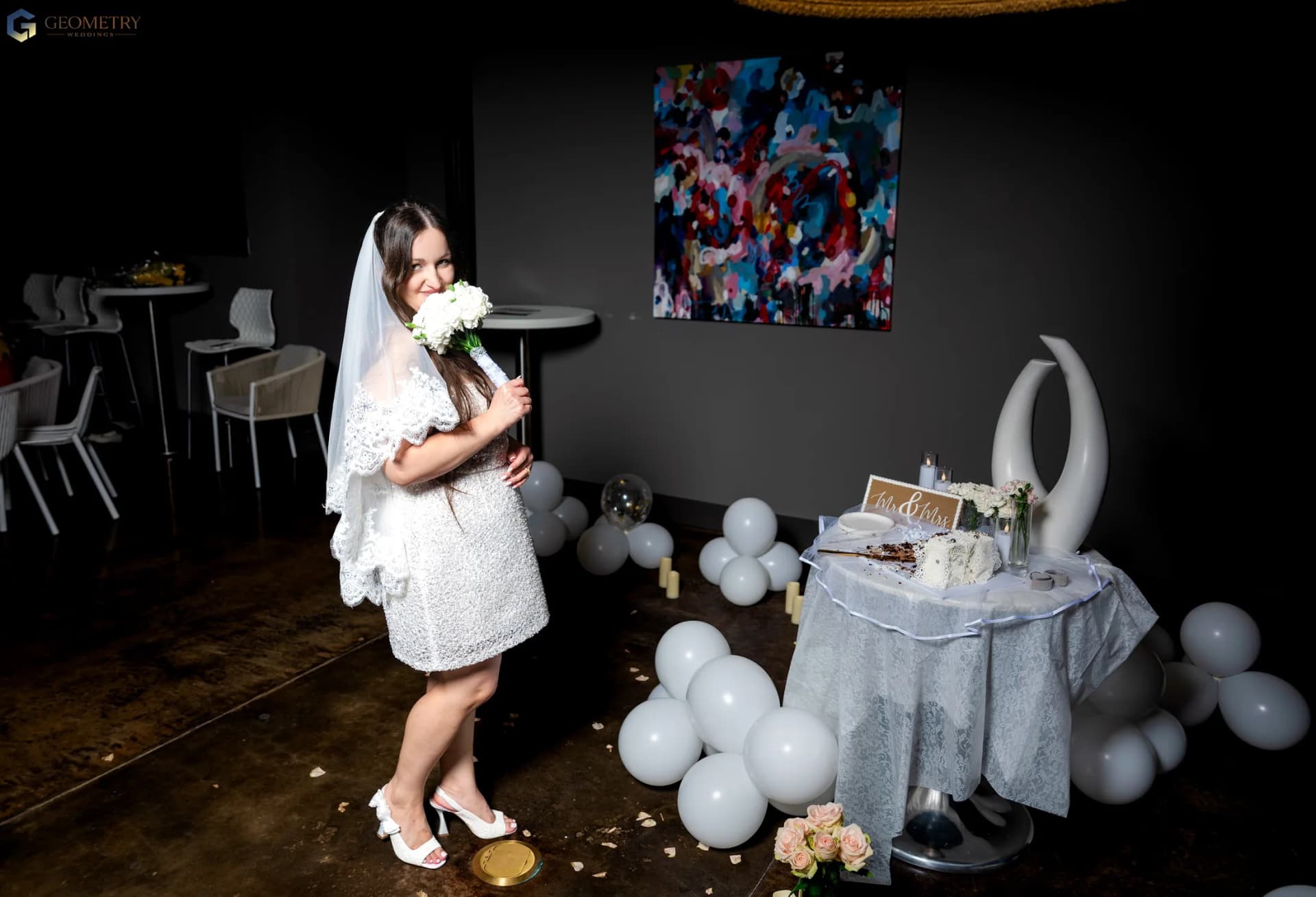 Final bridal portrait beside the wedding table and floral details