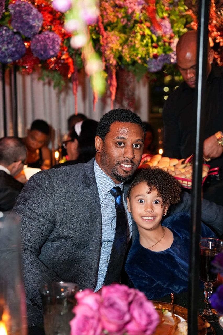 Father and daughter candid at Dallas wedding reception
